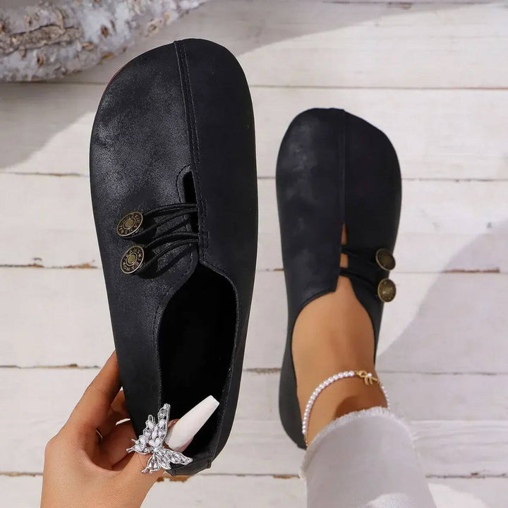 Blue women's walking orthopedic shoes with arch support, designed for cushioned comfort & foot health.