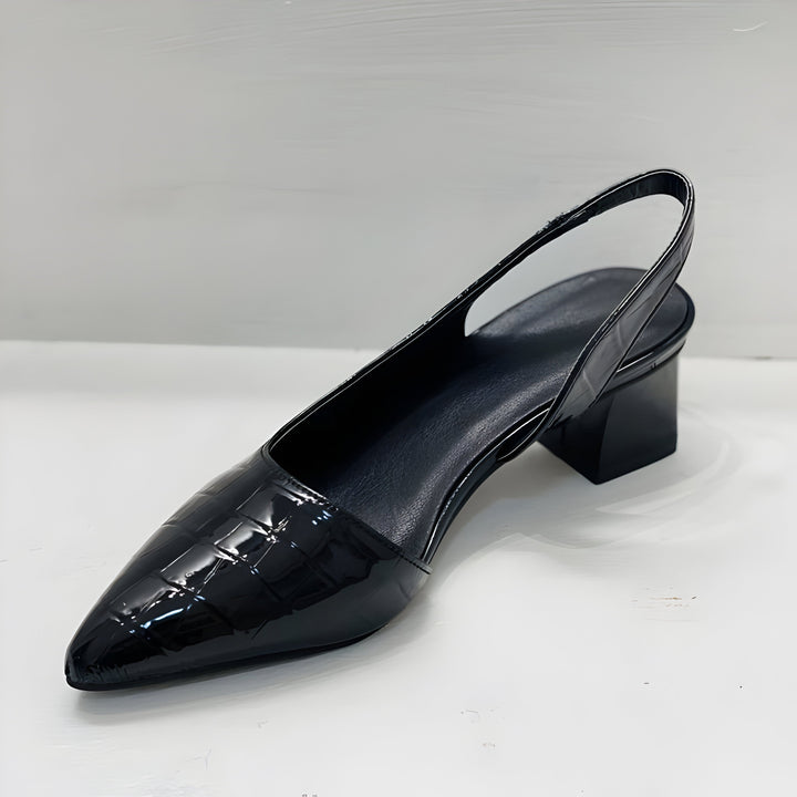 Stylish orthopedic slingback heels for women, offering superior comfort and support with a fashionable pointed toe.
