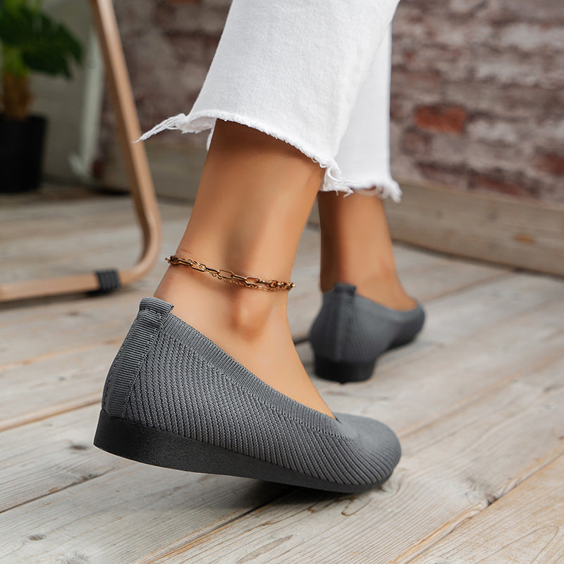 Flexible women's walking shoes with orthopedic support & easy slip-on entry.