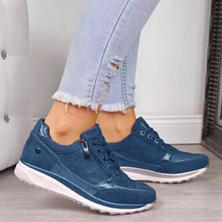 Women's orthopedic support sneakers for active comfort, ideal for walking & fitness activities.