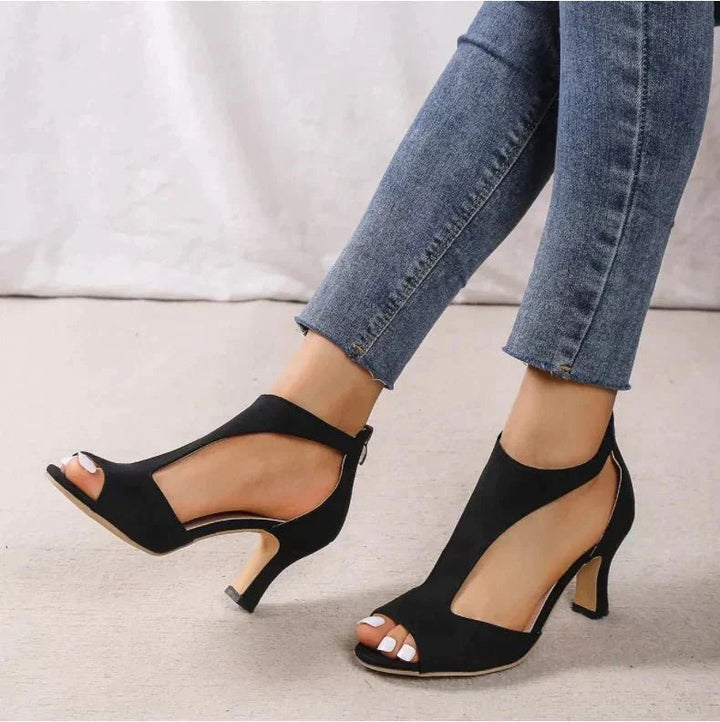 Versatile women's orthopedic T-strap heels. Stylish comfort footwear with a supportive mid-heel design.
