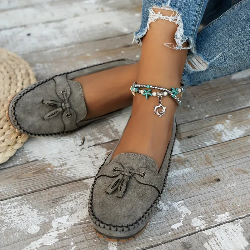 Comfortable women's orthopedic tassel loafers with premium arch support, ideal slip-on walking shoes.