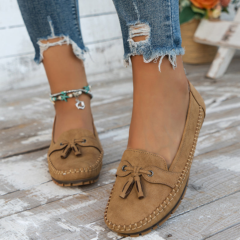 Slip-on orthopedic loafers for women, cushioned design with arch support for all-day walking comfort.