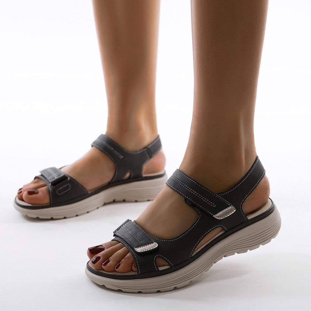 Women's orthopedic walking sandals with arch support, adjustable straps, and comfort for summer walks.