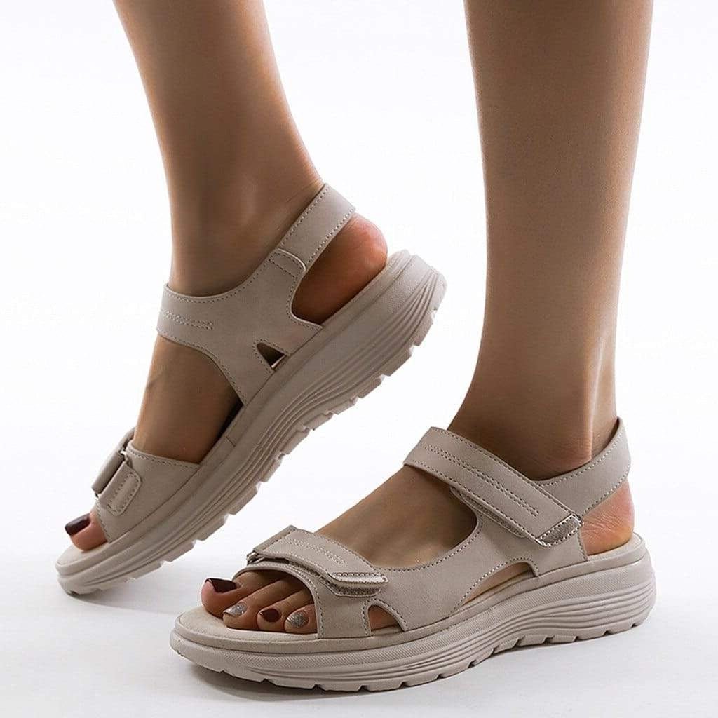 Women's walking sandals with strong arch support & adjustable straps for ultimate comfort & foot pain relief.