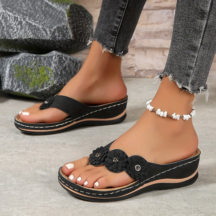 Women's comfortable orthopedic wedge sandals with arch support for summer.