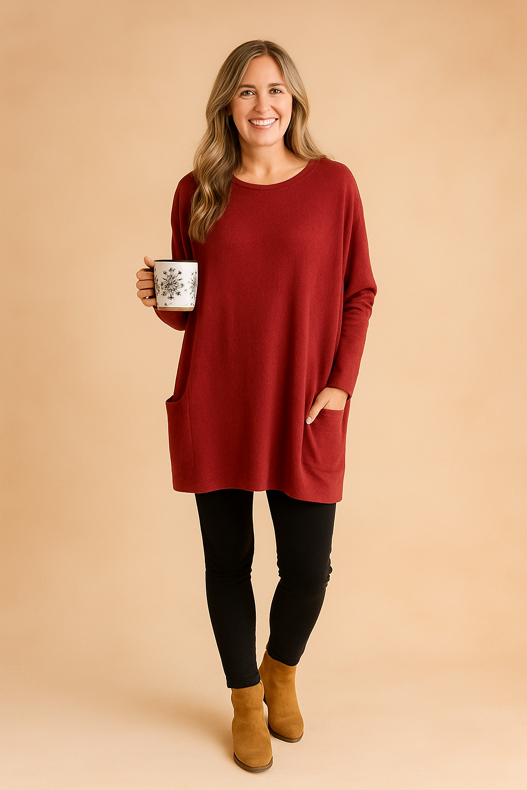 Women's oversized sweater featuring practical pockets. Comfortable, versatile pullover for everyday fall fashion.