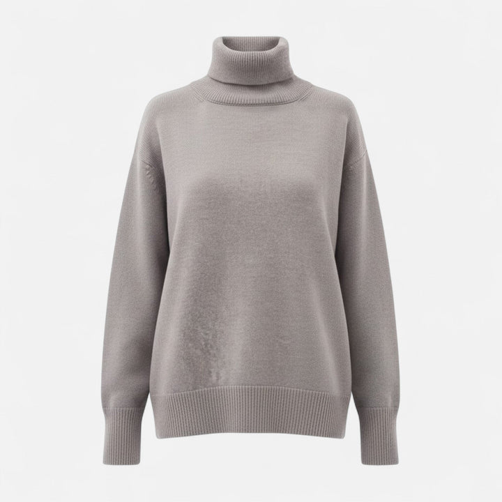 Women's oversized thick knit turtleneck sweater, perfect for winter warmth & cozy comfort.