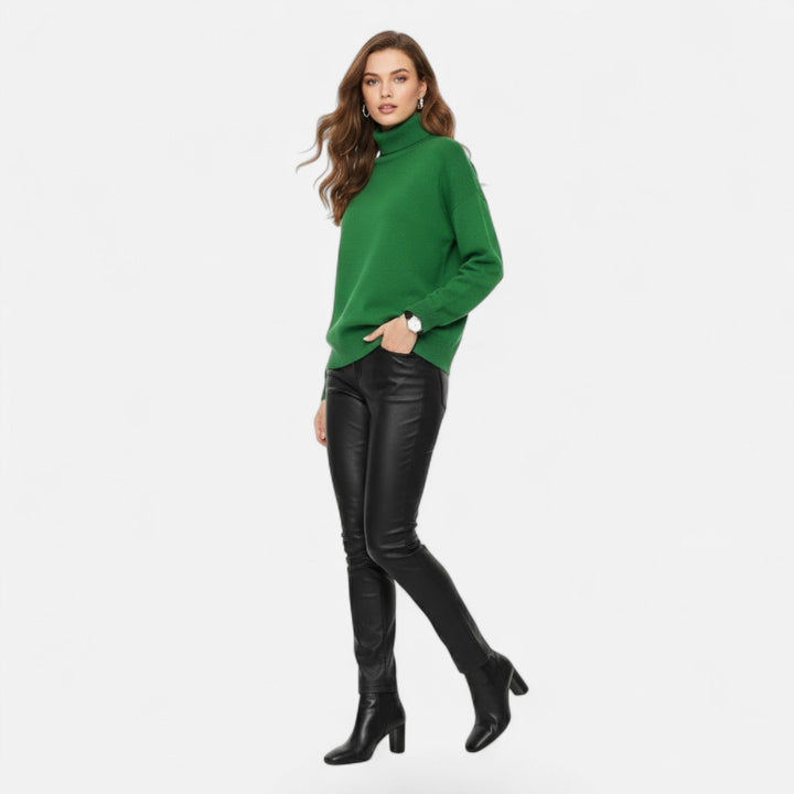 Women's comfortable thick knit oversized turtleneck sweater, great for winter warmth & style.