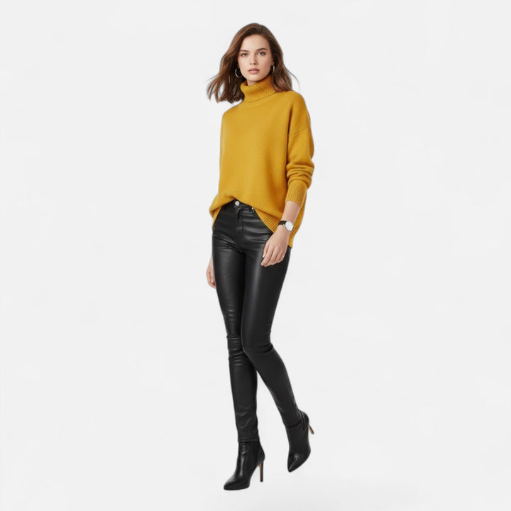 Chic women's thick knit oversized turtleneck, perfect relaxed fit for cozy winter fashion.