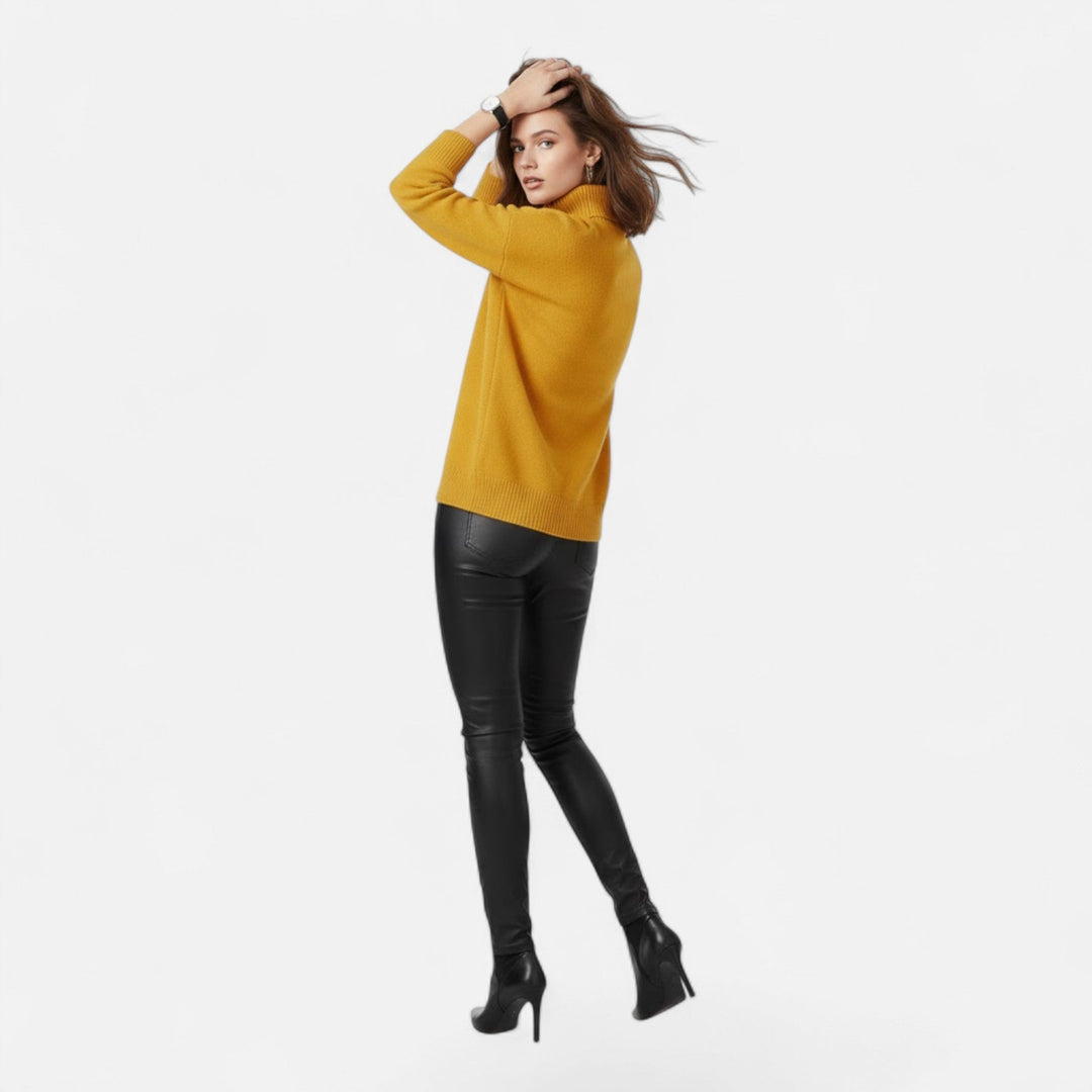 Elegant women's oversized turtleneck sweater, a warm thick knit pullover for stylish fall wear.