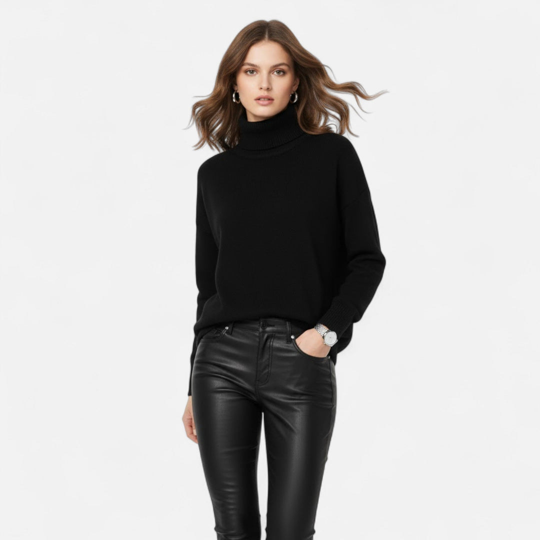 Women's warm oversized turtleneck, a thick knit elegant pullover for sophisticated winter style.