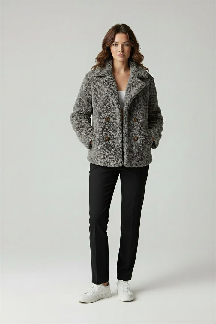 Stylish women's warm winter coat, oversized for comfort & layering.