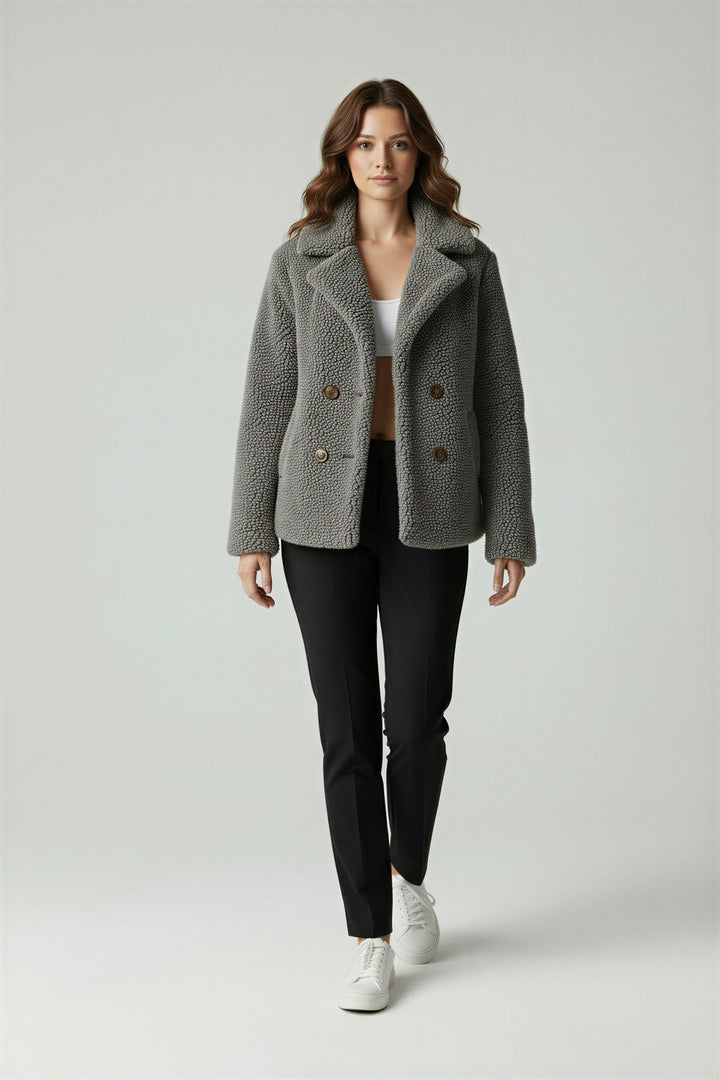Cozy women's oversized jacket, great for staying warm in winter weather.