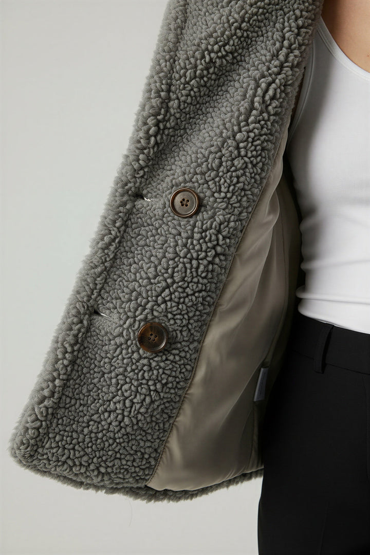 Stylish women's winter outerwear, a comfortable oversized jacket.