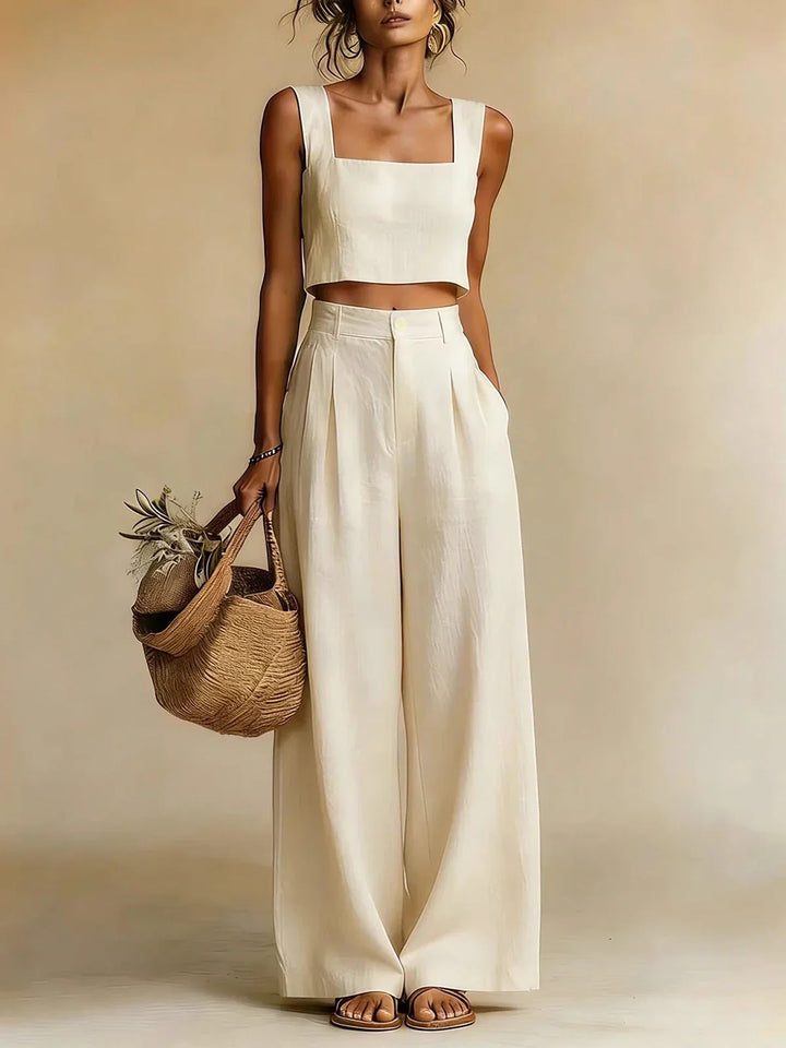 Coordinated peachy women's two-piece set featuring a relaxed fit top & elegant palazzo pants, summer style.