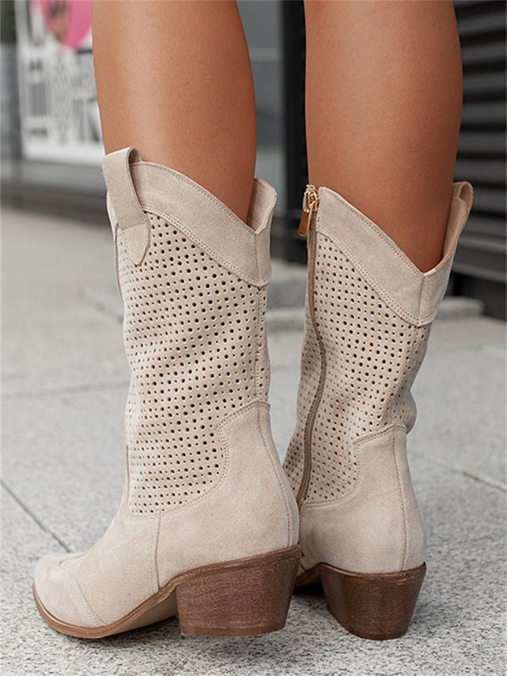 Stylish women's perforated cowboy ankle boots, featuring a comfortable block heel.