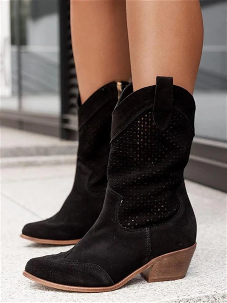 Fashionable women's perforated Western ankle boots with a sturdy block heel for daily wear.