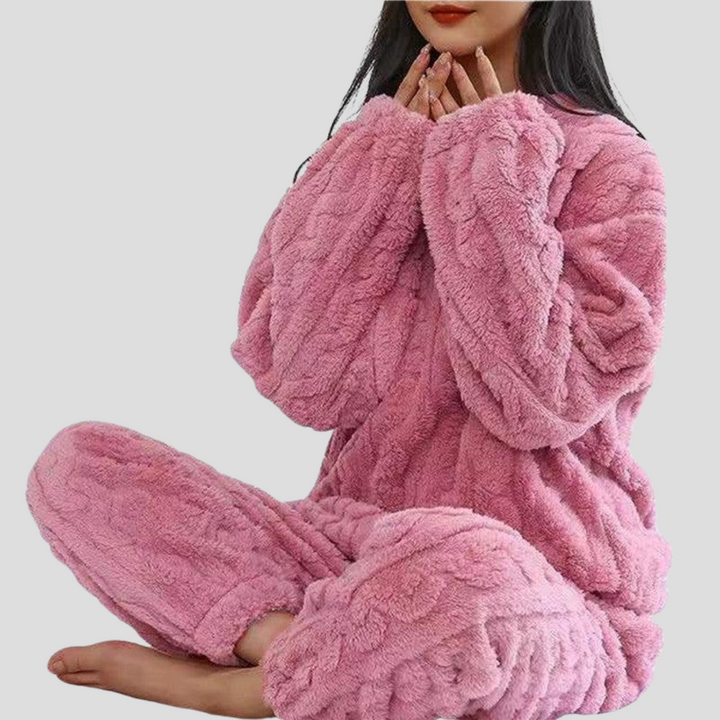 Plush, soft women's fleece pajama set. Experience cozy comfort and warmth with this elegant winter sleepwear.