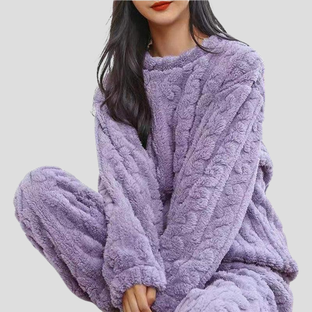 Premium women's plush fleece pajama set, designed for ultimate warmth and comfort. Soft, cozy loungewear.