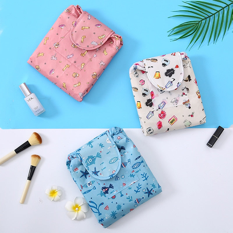 Grey flamingo portable drawstring cosmetic bag, a stylish & compact travel organizer for beauty essentials.