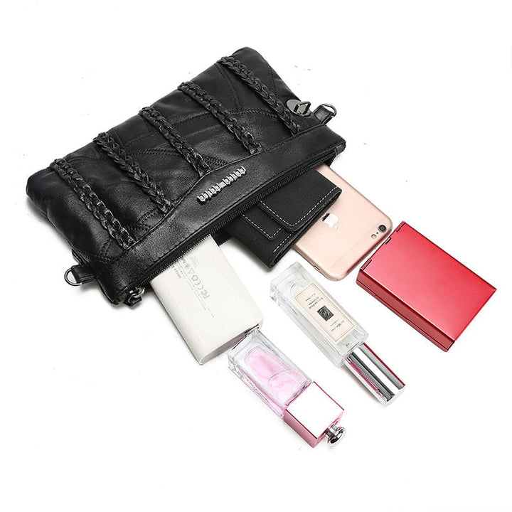 Spacious PU leather women's crossbody clutch bag. Functional shoulder purse for daily use or events.