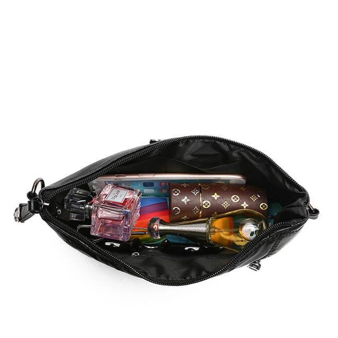 Durable PU leather women's crossbody clutch bag. A versatile shoulder purse offering style and ample space.