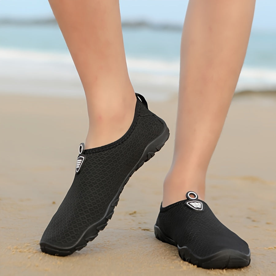 Quick dry women's water shoes for beach, pool & sports. Lightweight, breathable design with non-slip sole.