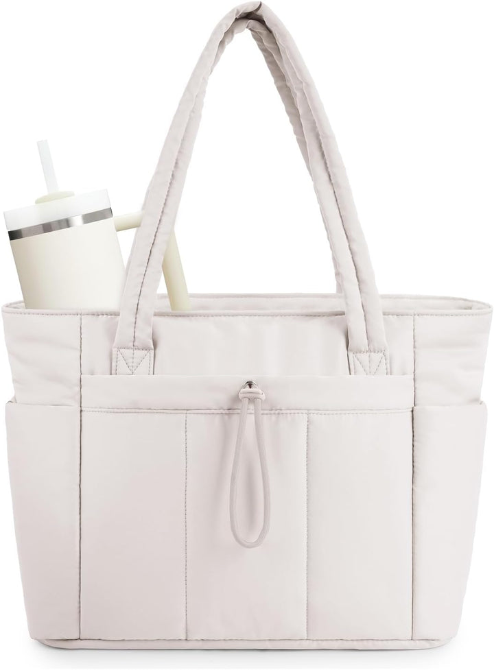 Women's quilted puffer tote with laptop sleeve & cup holder, perfect for travel & work.