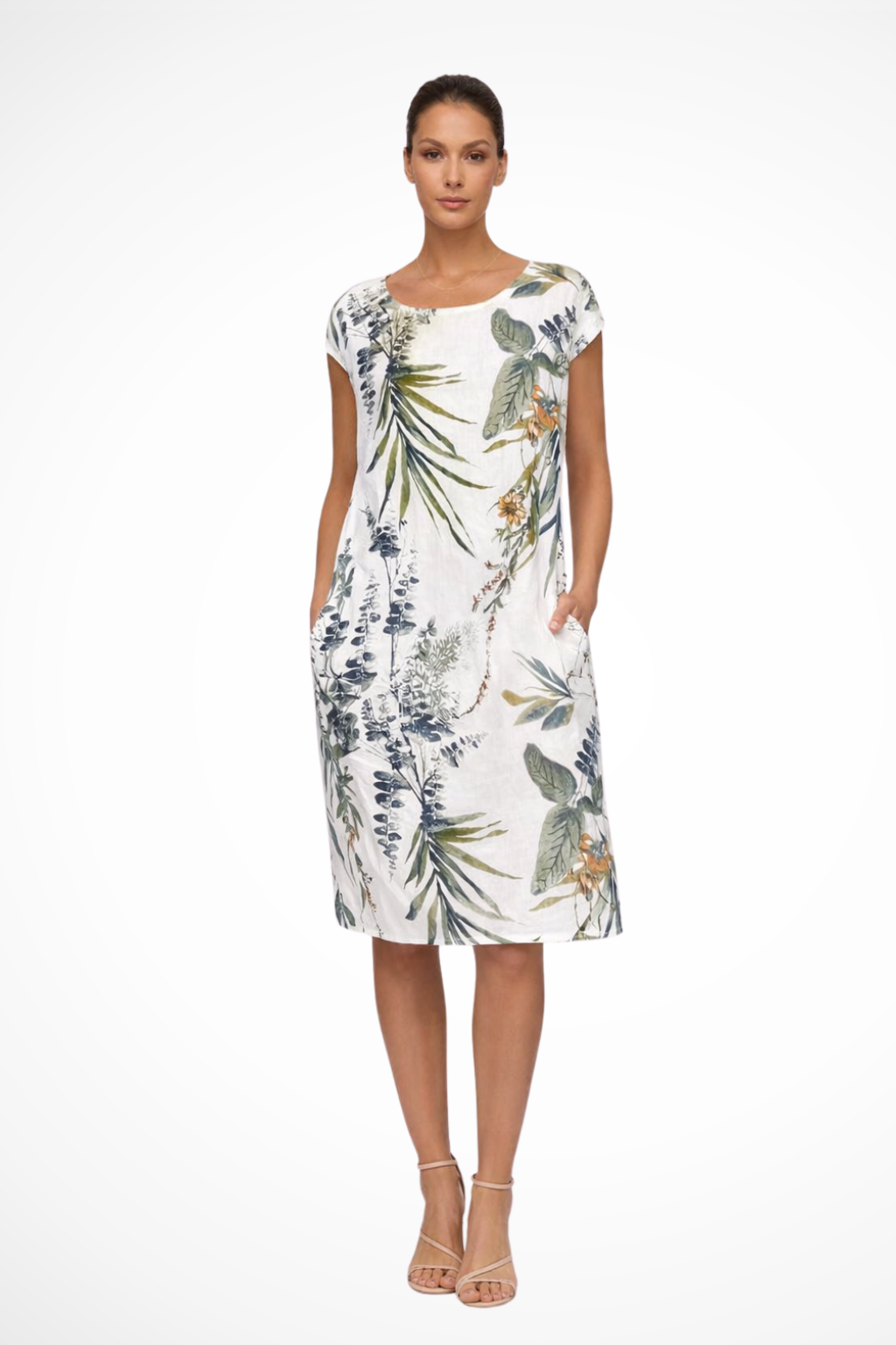 Women's relaxed fit botanical print summer dress. Sleeveless shift dress for casual day wear or beach trips.