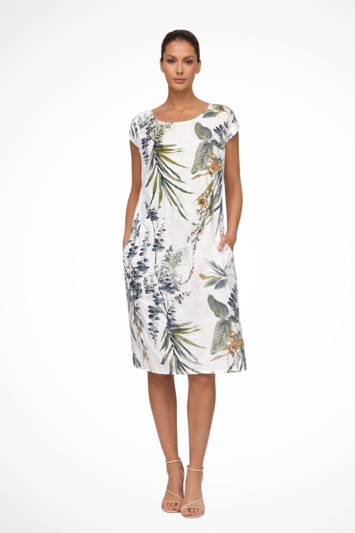 Women's relaxed fit botanical print summer dress. Sleeveless shift dress for casual day wear or beach trips.