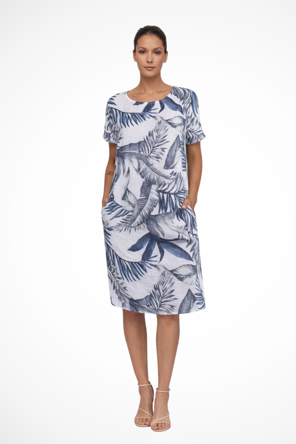 Comfortable women's sleeveless summer dress with vibrant botanical print. Relaxed fit, perfect for holidays.