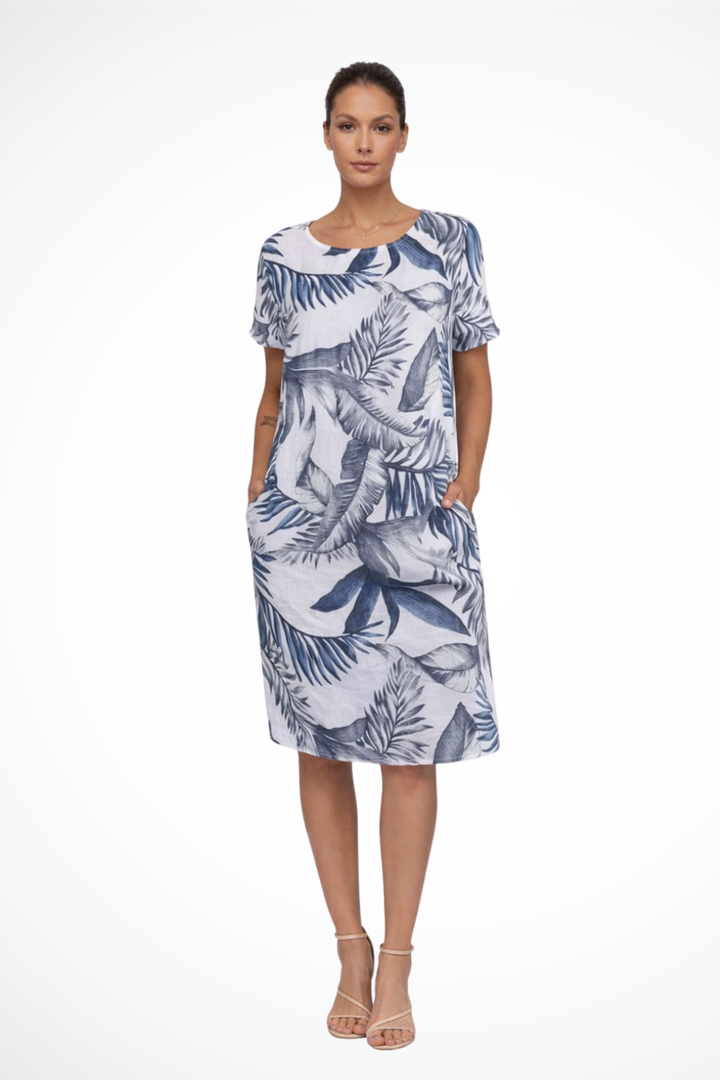 Comfortable women's sleeveless summer dress with vibrant botanical print. Relaxed fit, perfect for holidays.