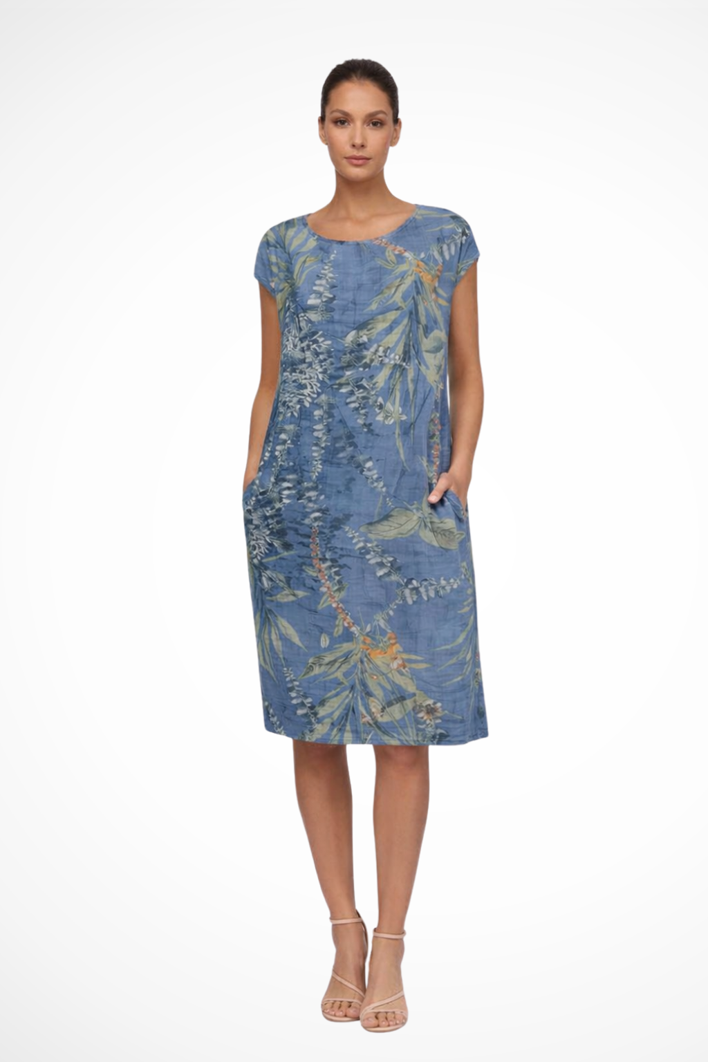 Sleeveless women's botanical print shift dress. Relaxed fit for comfortable summer days & holiday fashion.