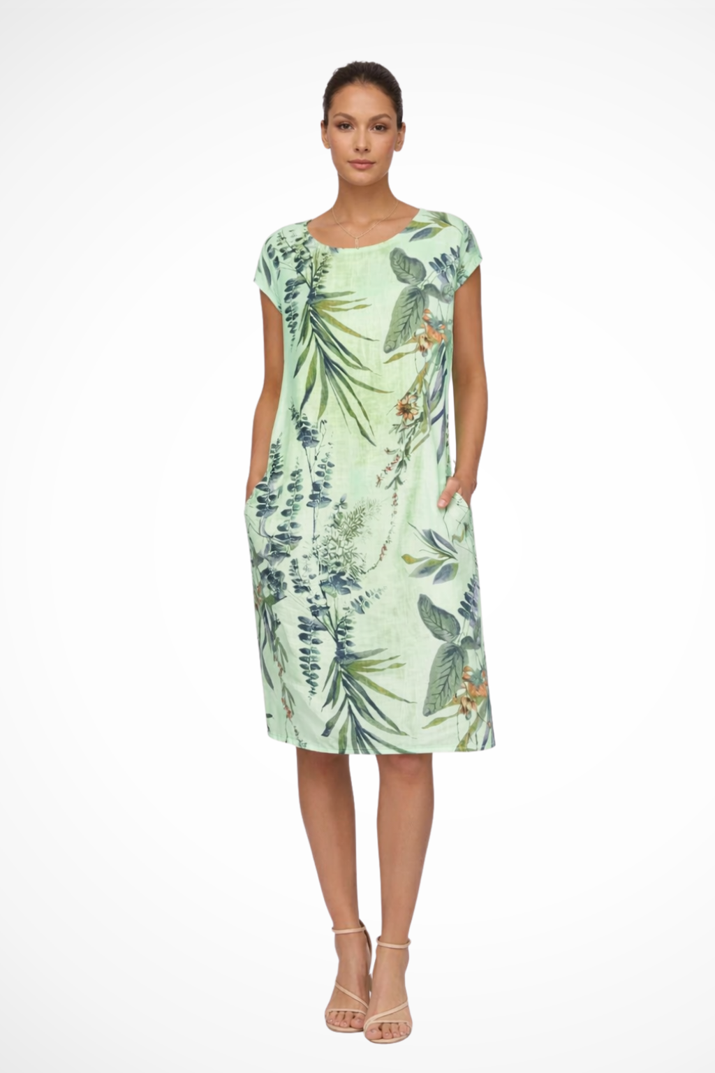 Vibrant botanical print women's relaxed fit summer dress. Sleeveless, easy-wear, ideal for sunny days.