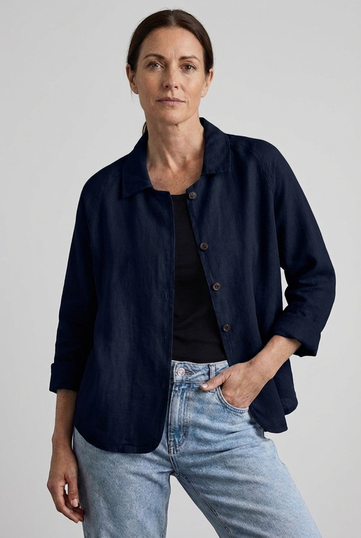 Women's relaxed fit button-through blouse, offering a comfortable, loose silhouette for everyday wear and weekend style.