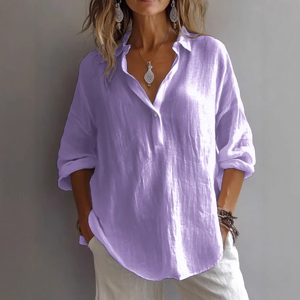 Versatile women's button-up shirt. Relaxed fit & wide sleeves make it a perfect casual top for any occasion.