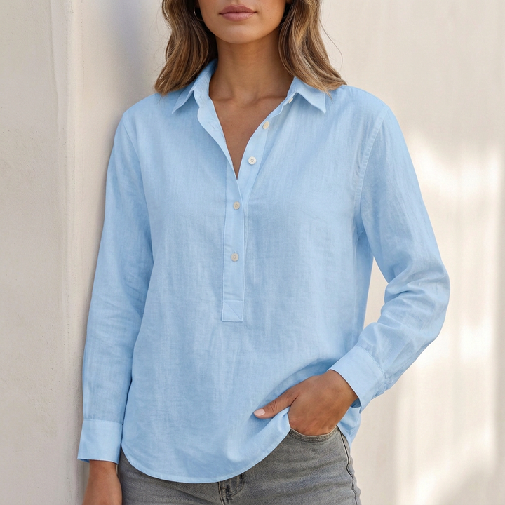 Comfortable women's relaxed fit V-neck blouse with long sleeves, a versatile top for any casual occasion.