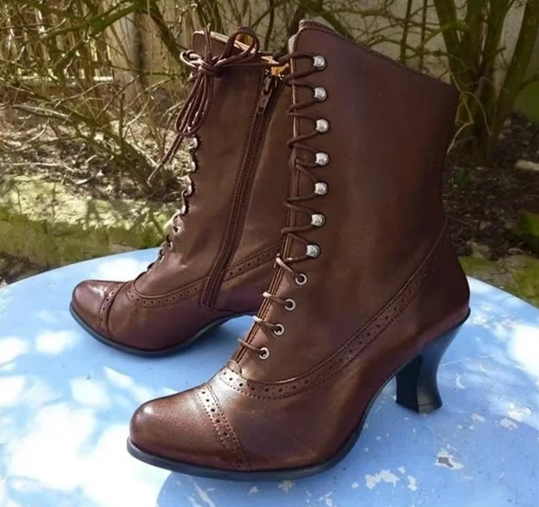 Women's retro biker boots with platform sole & pointed toe, available in black, brown, and gray for edgy fashion.