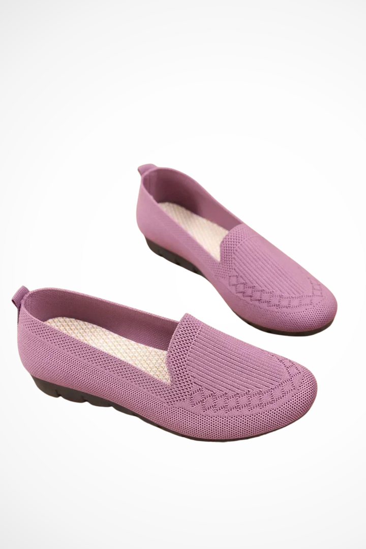 Stylish textured women's round toe slip-on ballet flats, a comfortable everyday choice.