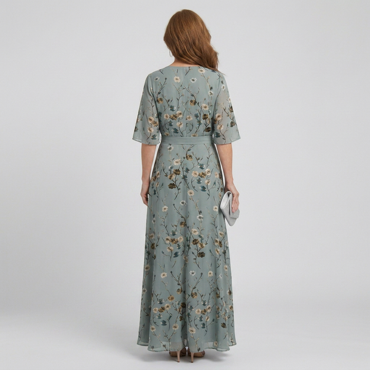 Sage green sleeveless floral maxi dress with halter top, relaxed fit for women's casual summer fashion.