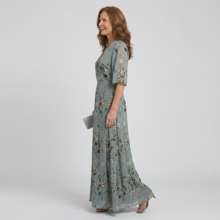 Elegant women's halter floral flowy maxi dress in sage green, ideal for summer outfits & vacation.