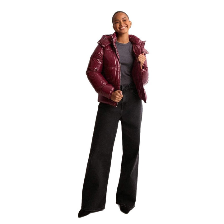 Versatile women's shiny quilted jacket. A trendy fall & winter coat with a removable hood for different looks.