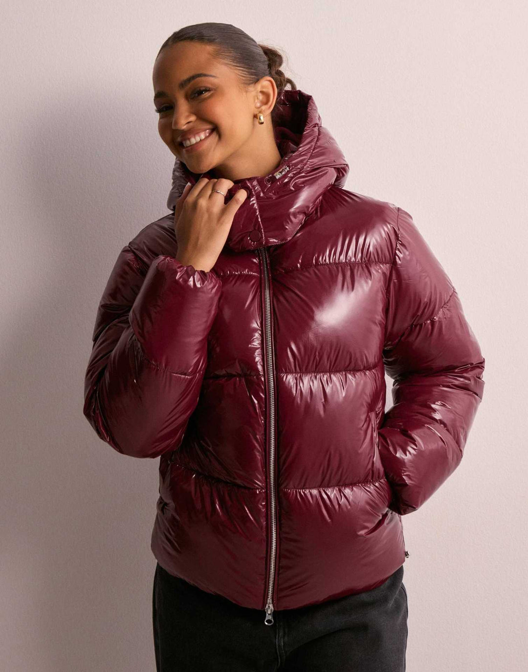 Shimmering women's quilted jacket with a cozy, warm lining. Stylish outerwear & casual coat with removable hood.