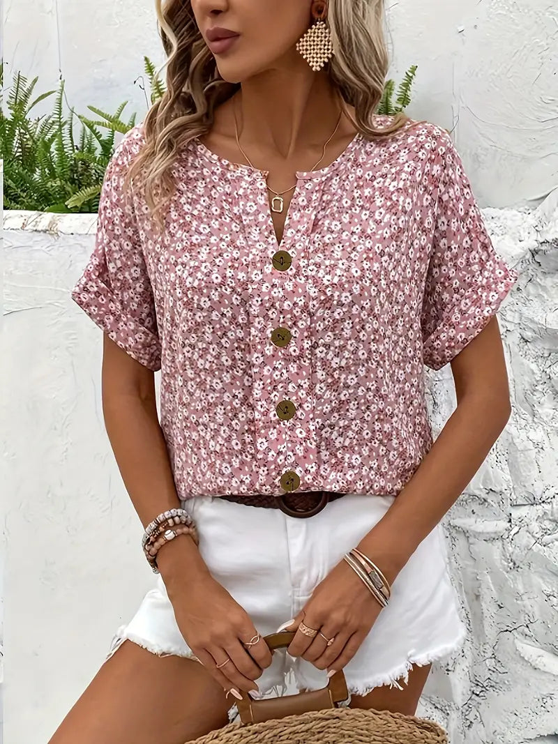 Fashionable pink floral print short sleeve button-down top for women, combining comfort with spring elegance.