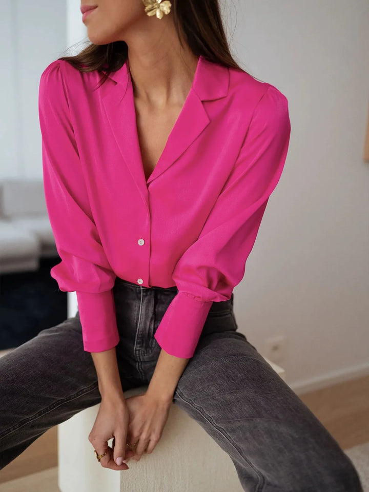 Stylish women's long sleeve button blouse with a silky soft feel & relaxed fit. Ideal for work or casual outfits.