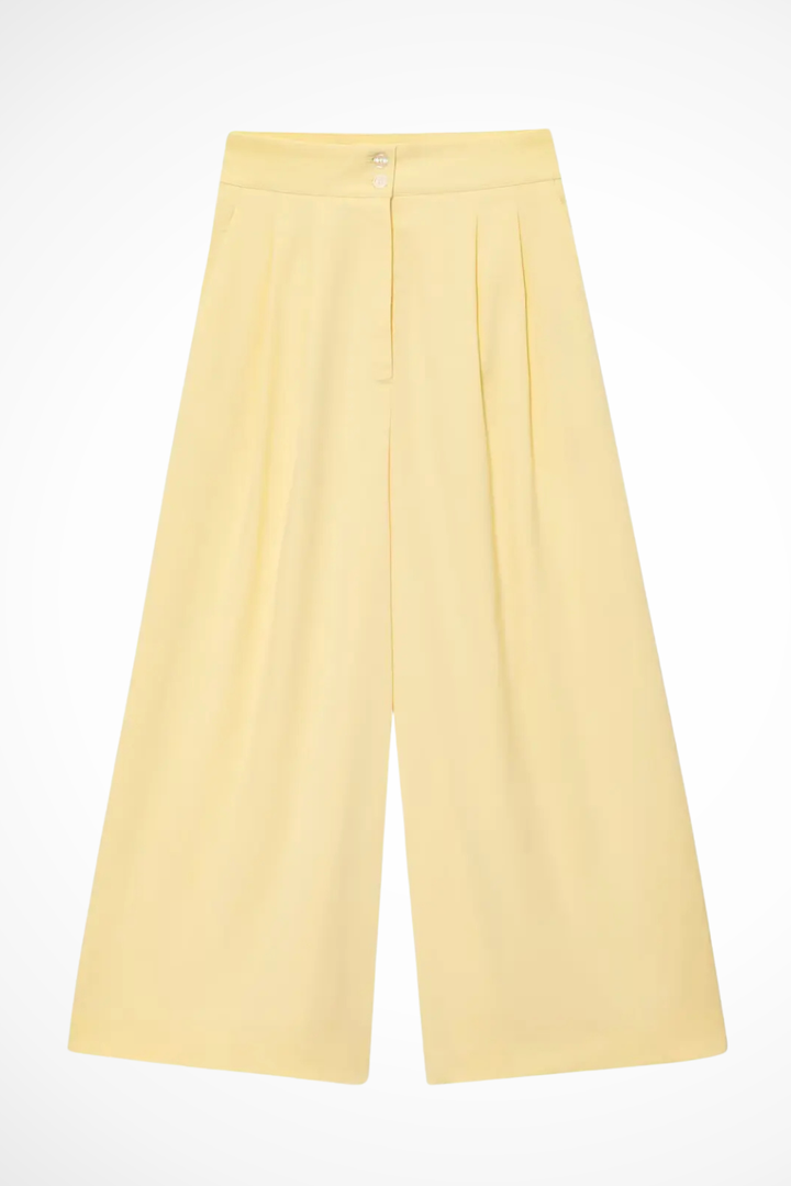 Women's two-piece fashion suit: v-neck sleeveless wrap top with belt & comfortable wide leg trousers.