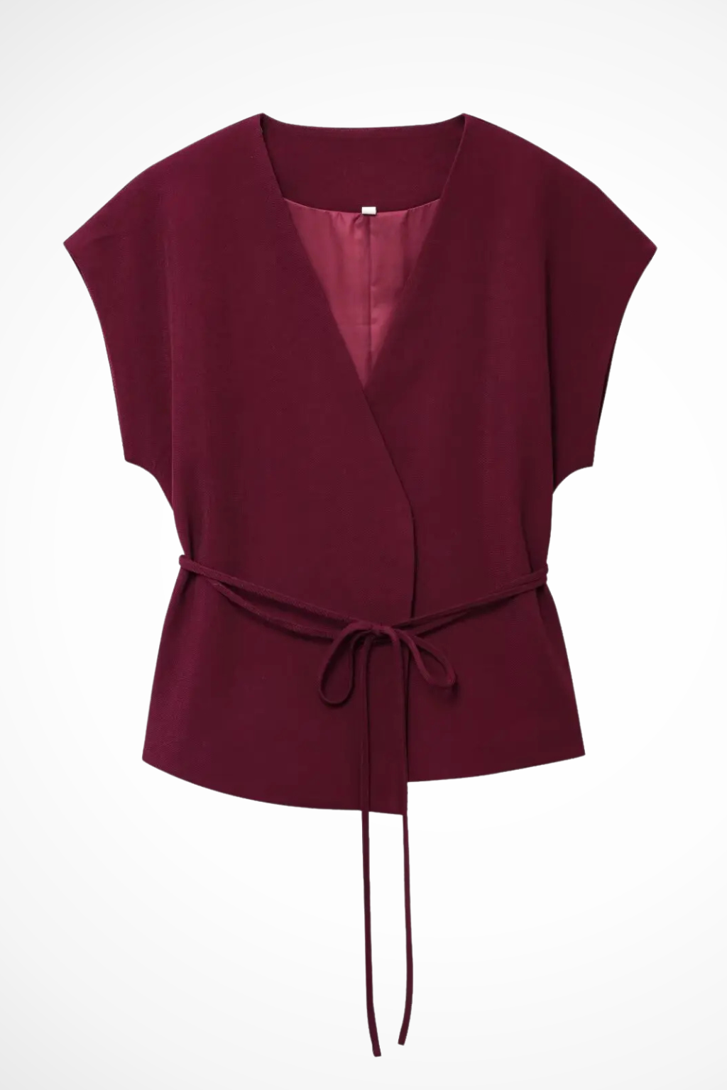 Stylish women's sleeveless suit set with v-neck wrap top & flowing wide leg trousers. Coordinated fashion.