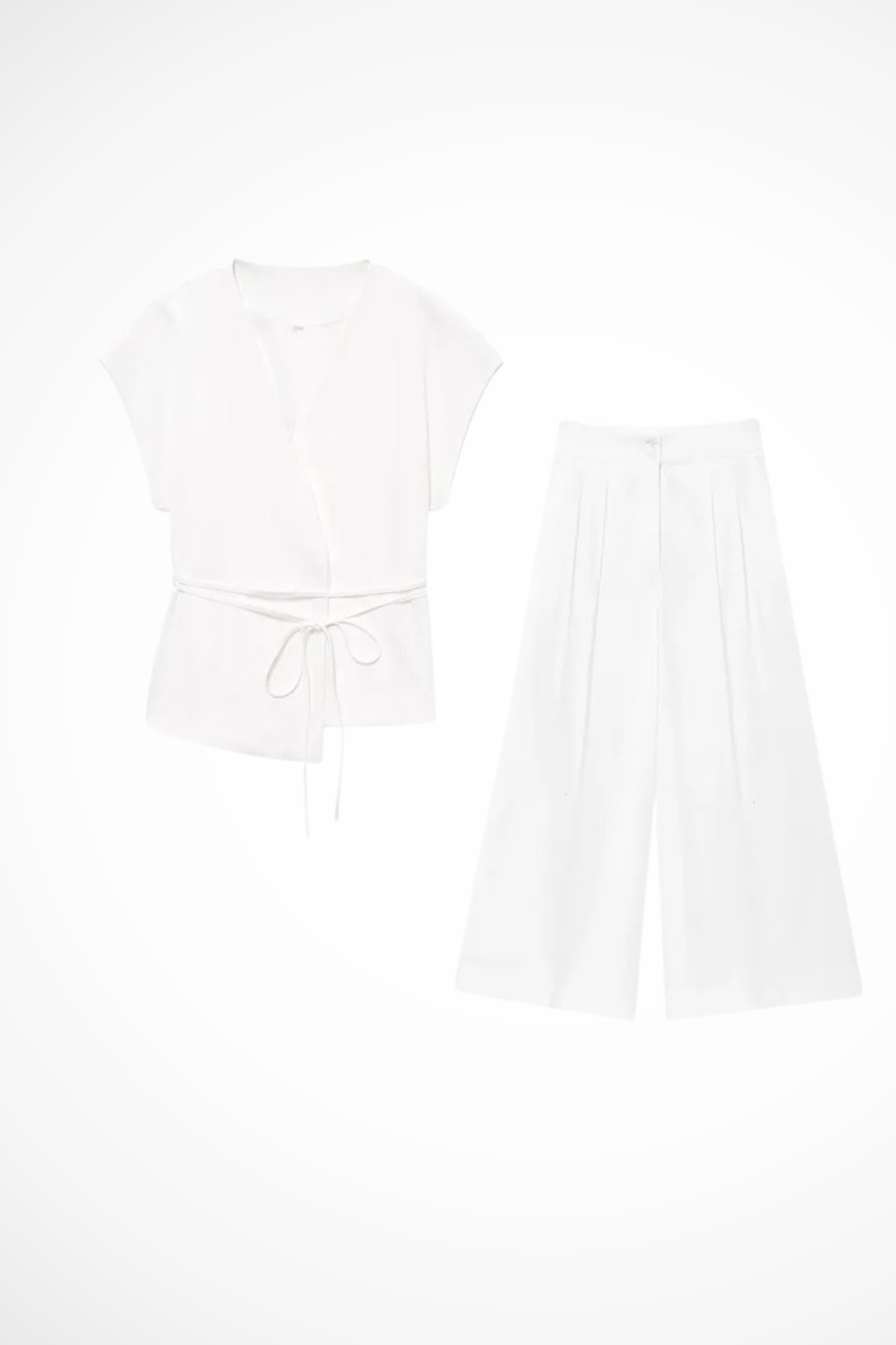 Women's versatile suit set. Sleeveless belted wrap top pairs with elegant wide leg trousers for various events.