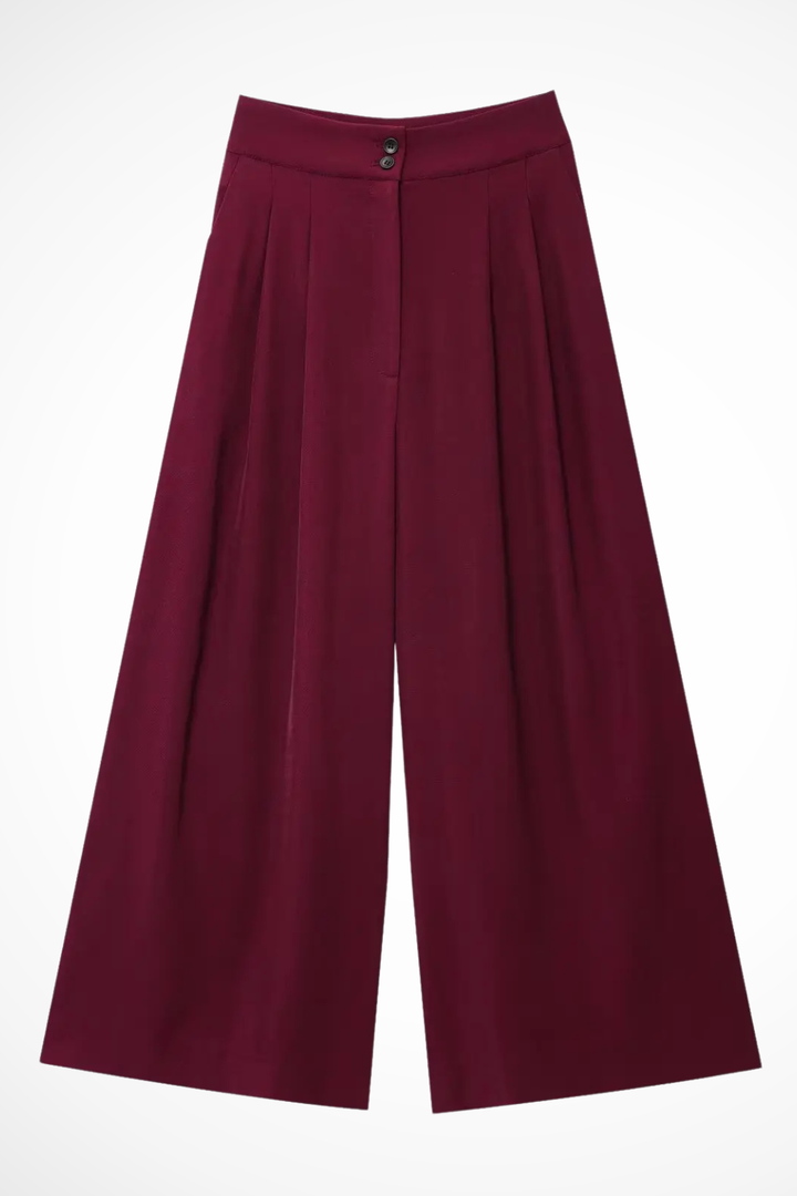 Versatile women's belted two-piece suit. Sleeveless wrap top and comfortable wide leg trousers for any occasion.